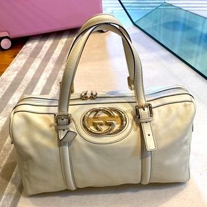 Authentic Gucci Boston Britt Duffle Bag in cream and gold very good condition